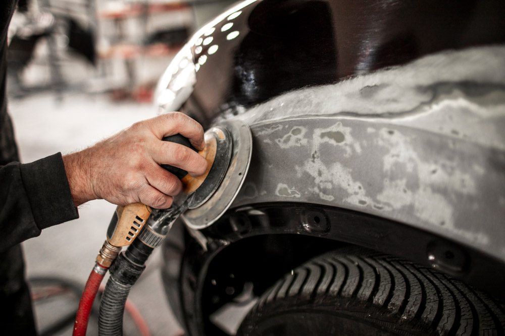sanding-car-panel-GettyImages-1183984899